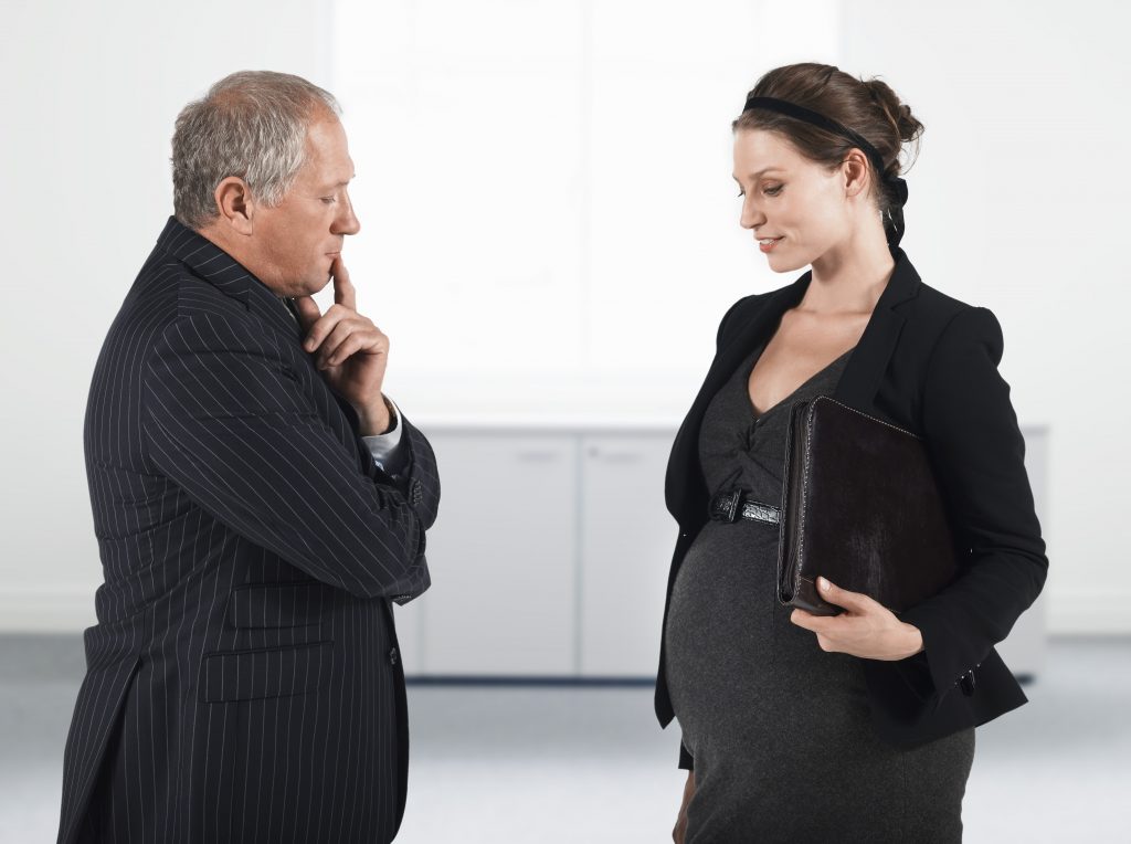 Boss and Pregnant Businesswoman